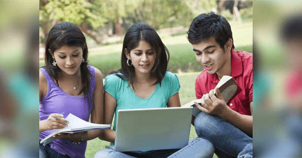 three students learning